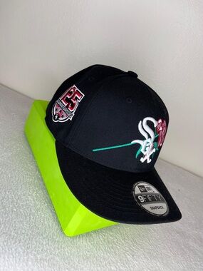 New Era Black Baseball Cap with White & Green Embroidery